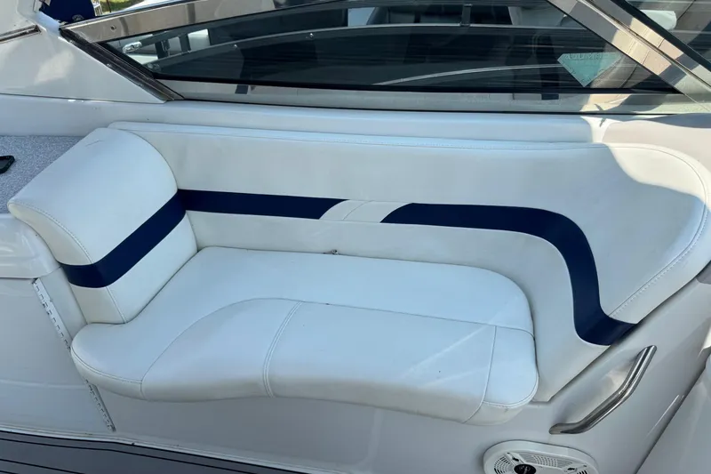 Slide: The Image of White and blue seating on 2004 Formula 280 Bowrider boat. - 26