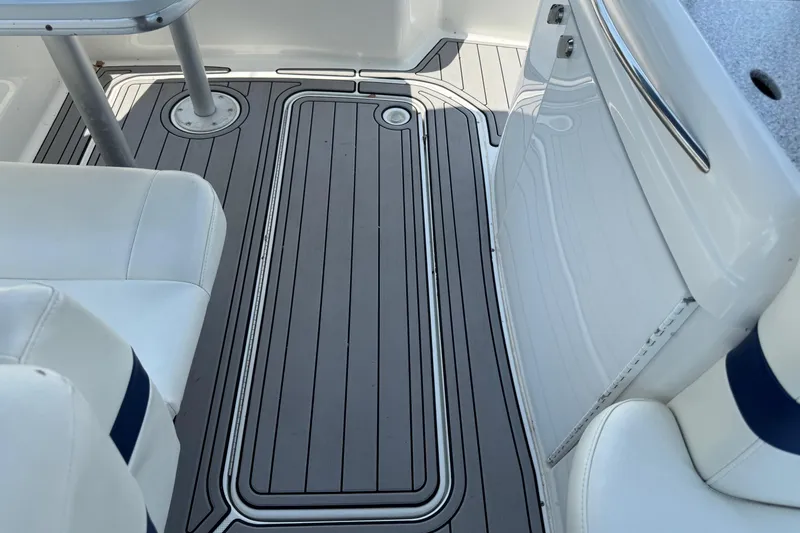 Slide: The Image of 2004 Formula 280 Bowrider interior with sleek seating and modern flooring design. - 43