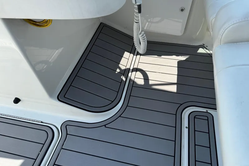 Slide: The Image of 2004 Formula 280 Bowrider interior with sleek, modern flooring and seating. - 46