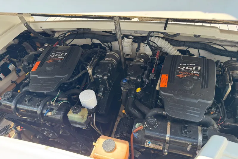 Slide: The Image of Twin MerCruiser 350 MPI engines in a 2004 Formula 280 Bowrider boat. - 49