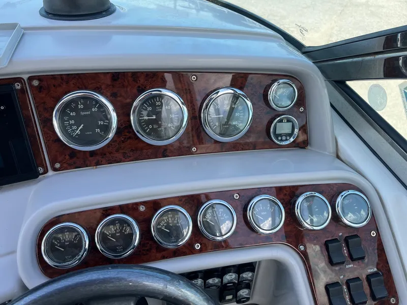 Slide: The Image of Dashboard of a 2004 Formula 280 Bowrider boat with gauges and controls. - 7