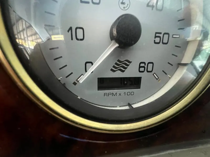 Slide: The Image of Close-up of a 2004 Four Winns 378 tachometer showing RPM reading. - 12