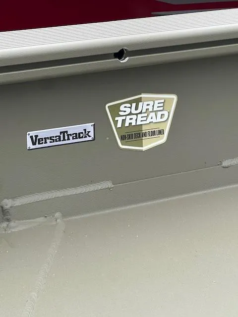 Slide: The Image of 2026 Tracker Grizzly 1650 T Prairie Wings Edition with VersaTrack and Sure Tread features. - 8