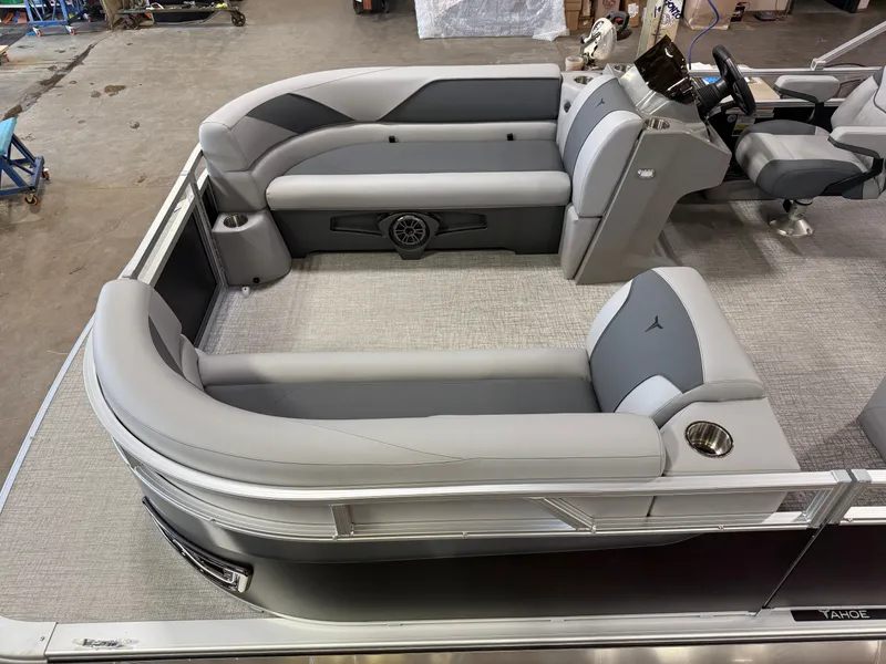 Slide: The Image of 2025 Tahoe Sport 2385 Swingback interior with gray seating and modern design. - 2