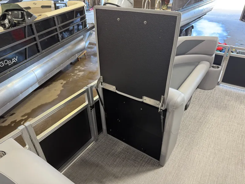 Slide: The Image of 2025 Tahoe Sport 2385 Swingback interior with Honda 4-Stroke EFI engine, featuring sleek seating. - 26