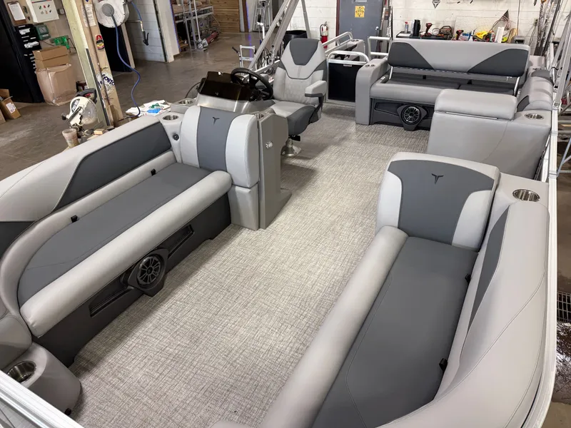 Slide: The Image of 2025 Tahoe Sport 2385 Swingback interior with gray seating and modern design. - 30