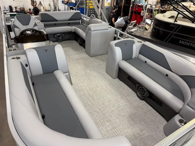 Slide: The Image of 2025 Tahoe Sport 2385 Swingback interior with gray seating and modern design. - 31