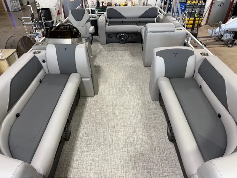 Slide: The Image of 2025 Tahoe Sport 2385 Swingback interior with gray seating and modern design. - 6