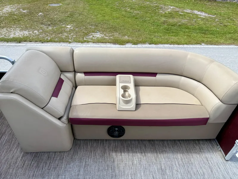 Slide: The Image of 2022 Godfrey Sweetwater 2286 C boat seating with beige and maroon upholstery, cup holder included. - 15