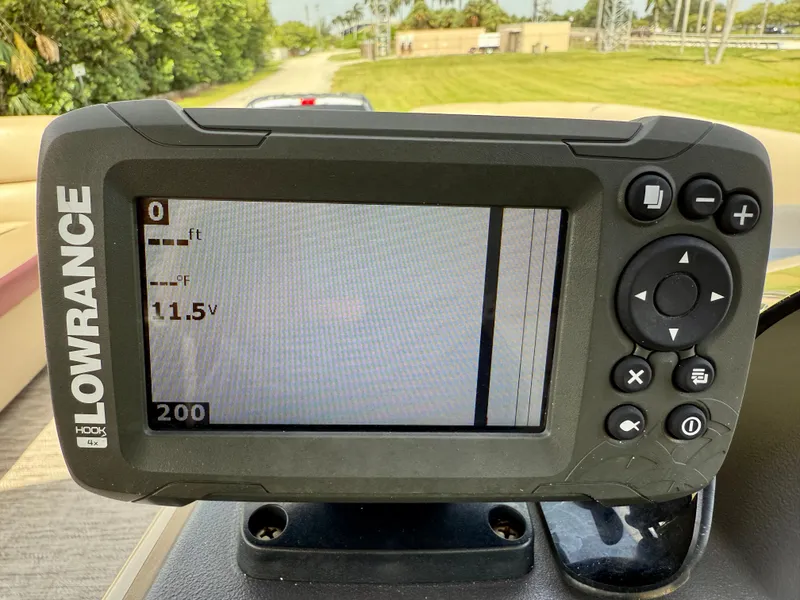 Slide: The Image of Lowrance fish finder on 2022 Godfrey Sweetwater 2286 C boat, displaying 11.5 volts. - 27