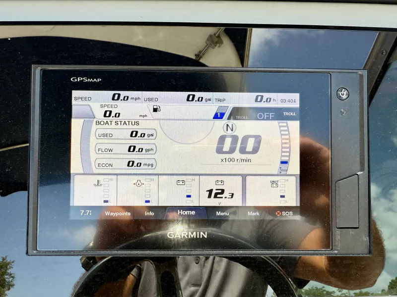 Slide: The Image of Garmin GPS display on 2021 Regal 26 XO boat showing speed and fuel status. - 22