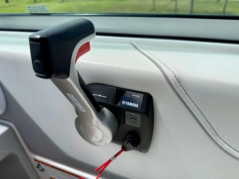 Slide: The Image of Throttle control of 2021 Regal 26 XO boat with Yamaha system. - 26