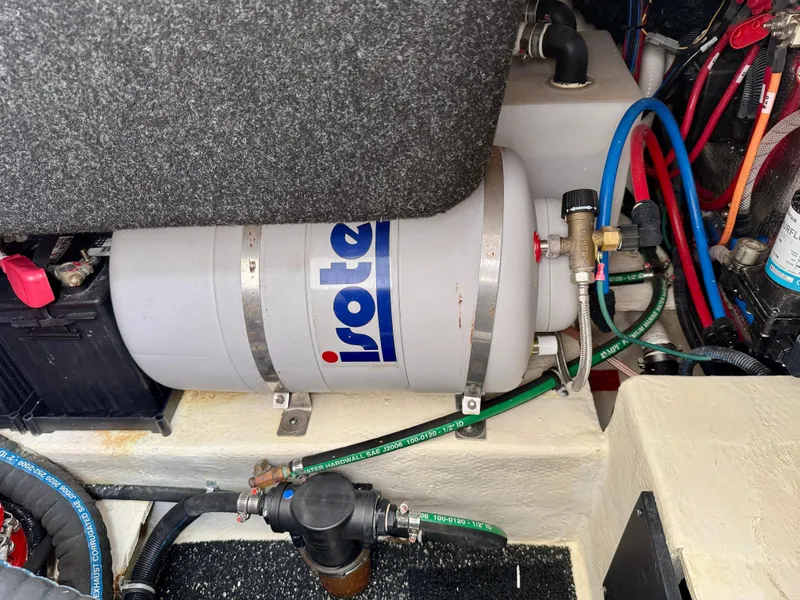 Slide: The Image of Engine compartment of a 2021 Regal 26 XO boat with Isotemp water heater. - 48