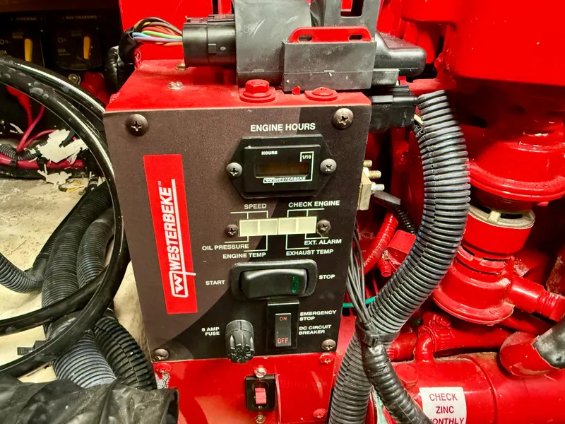 Slide: The Image of Control panel of a Westerbeke engine in a 2021 Regal 26 XO boat. - 49