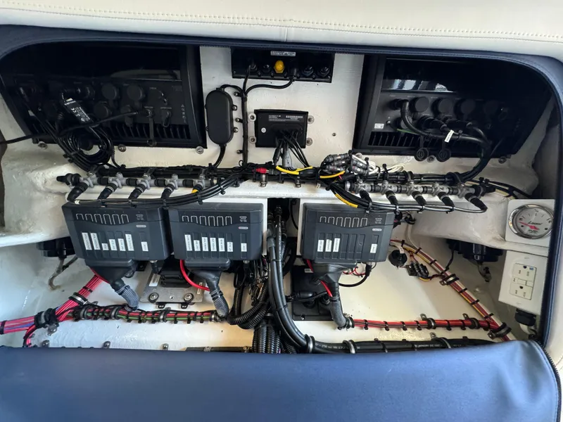 Slide: The Image of Electrical system of a 2019 Nor-Tech 390 Sport Center Console boat, showcasing wiring and components. - 10