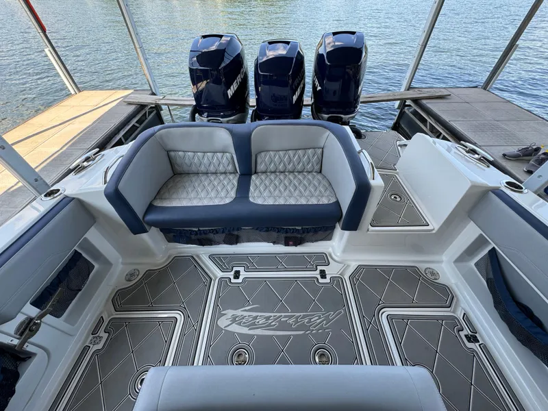 Slide: The Image of 2019 Nor-Tech 390 Sport Center Console with triple Mercury engines and luxurious seating. - 13