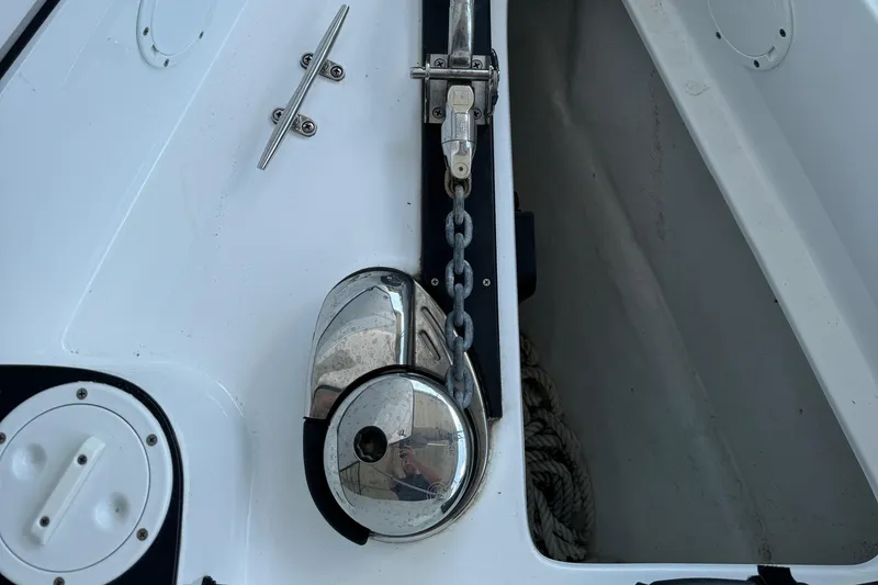 Slide: The Image of Close-up of 2019 Nor-Tech 390 Sport Center Console anchor chain and cleat. - 27