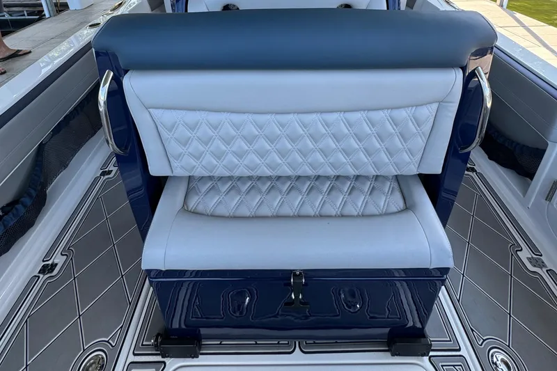 Slide: The Image of 2019 Nor-Tech 390 Sport Center Console seat with quilted upholstery and sleek design. - 39
