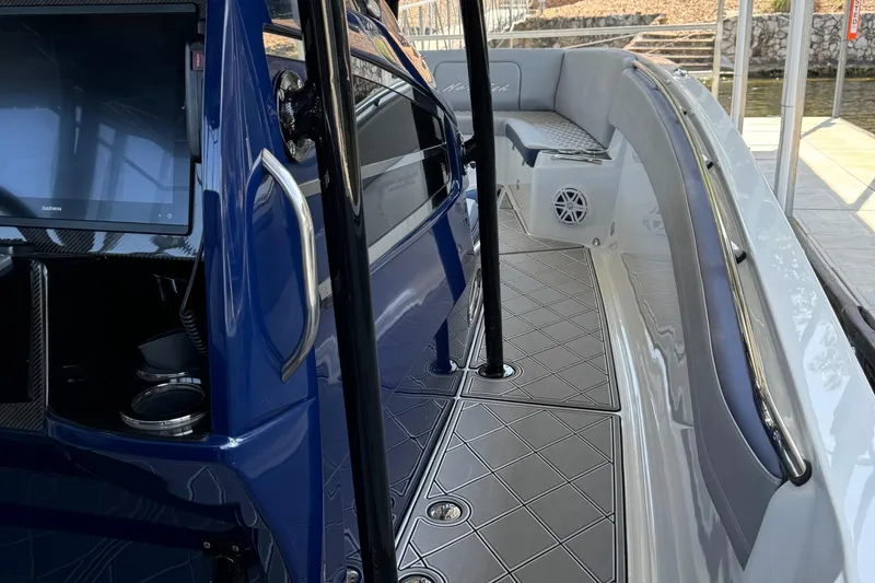 Slide: The Image of 2019 Nor-Tech 390 Sport Center Console boat interior with sleek design and modern features. - 41