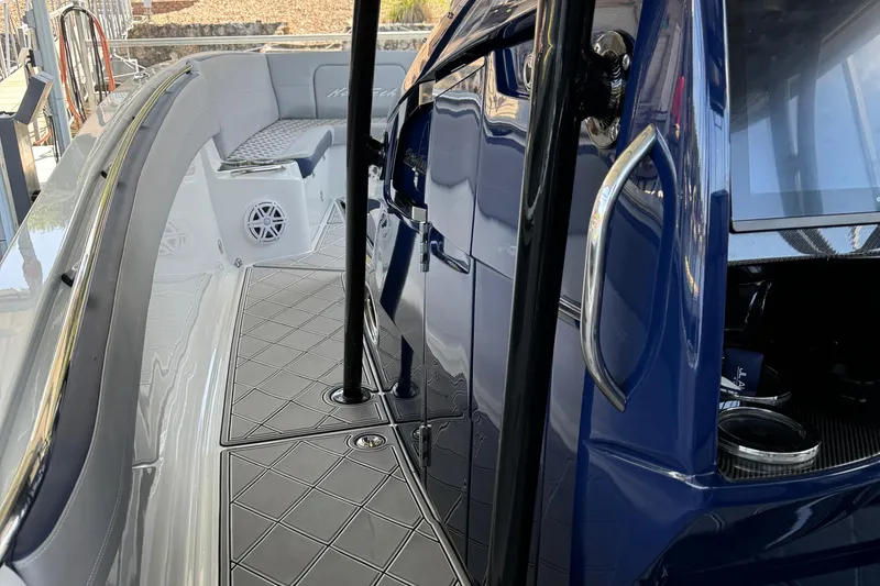 Slide: The Image of 2019 Nor-Tech 390 Sport Center Console interior with sleek design and modern features. - 42