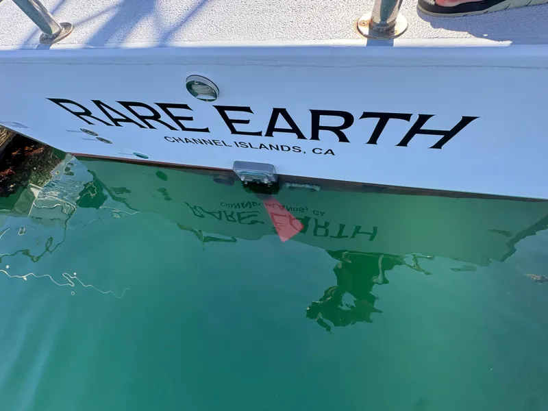 Slide: The Image of Boat named "Rare Earth" docked at Channel Islands, CA, Anderson 26, 1992 model. - 12