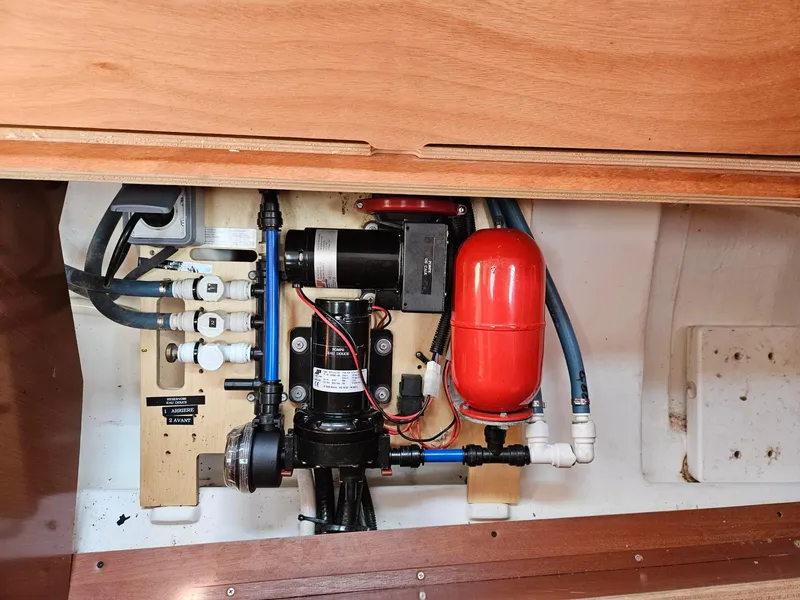 Slide: The Image of Electrical and plumbing system inside a 2012 Beneteau Oceanis 37 sailboat. - 24