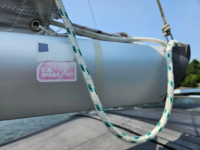Slide: The Image of Close-up of a Beneteau Oceanis 37 sailboat mast with U.S. Spars sticker, 2012 model. - 6