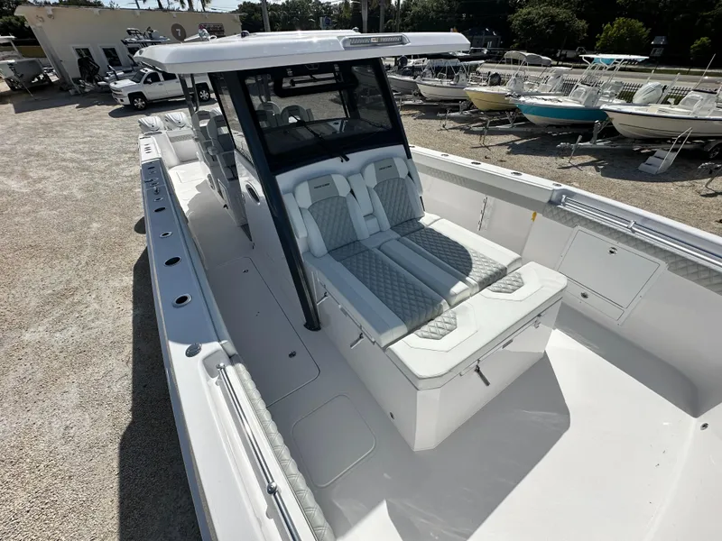 Slide: The Image of 2026 Twin Vee 400 GFX2 CC boat with spacious seating and modern design. - 24
