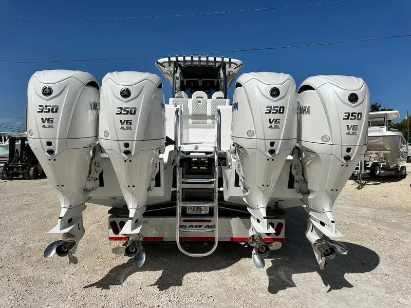 Slide: The Image of 2026 Twin Vee 400 GFX2 CC boat with four Yamaha 350 V6 outboard engines. - 4