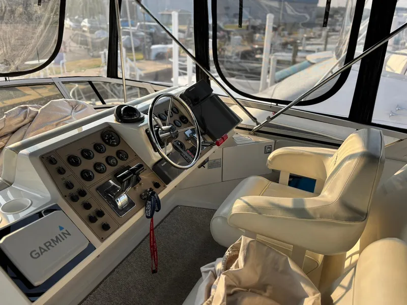 Slide: The Image of Helm of 2000 Carver 406 Aft Cabin Motor Yacht with Garmin navigation system. - 11