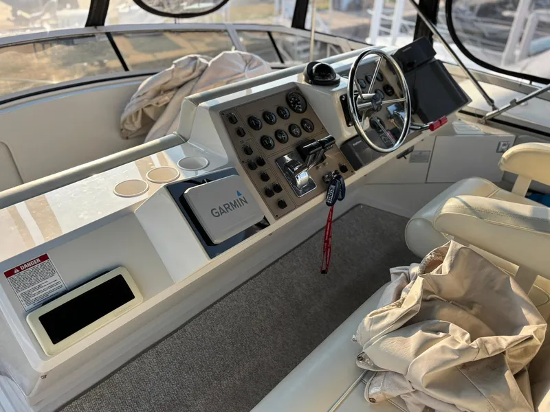 Slide: The Image of Helm of 2000 Carver 406 Aft Cabin Motor Yacht with Garmin navigation system. - 12
