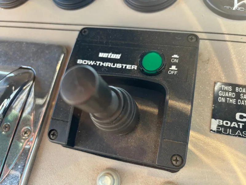 Slide: The Image of Control panel of a 2000 Carver 406 Aft Cabin Motor Yacht with bow thruster switch. - 18