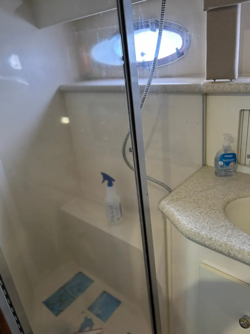 Slide: The Image of Bathroom interior of 2000 Carver 406 Aft Cabin Motor Yacht with shower and sink. - 42
