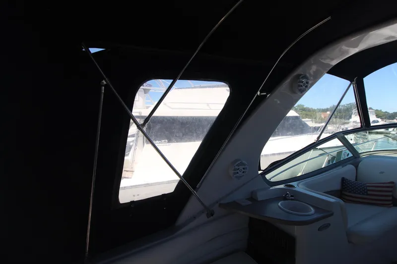 Slide: The Image of Interior view of 2004 Four Winns 348 Vista boat with seating and window. - 10