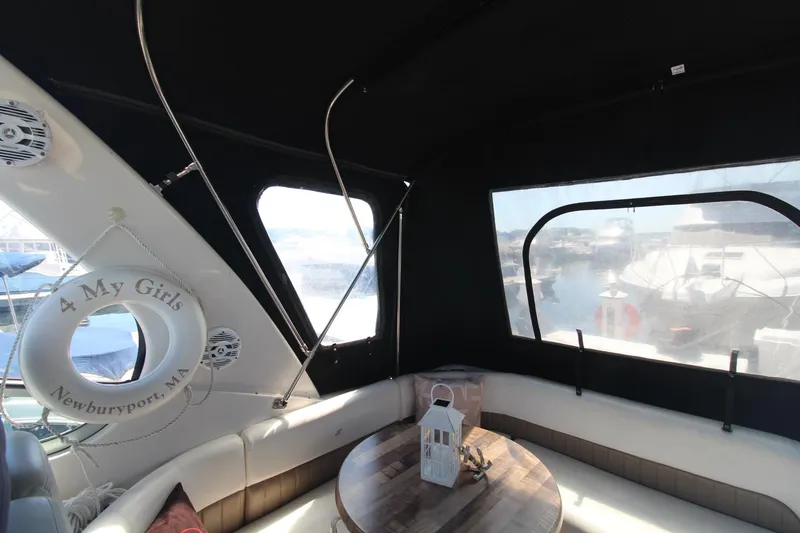 Slide: The Image of Interior of 2004 Four Winns 348 Vista boat with seating and nautical decor. - 8
