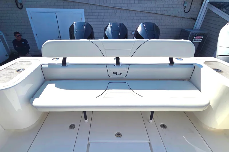Slide: The Image of 2023 SeaVee 37 Z boat with triple engines and rear seating. - 11