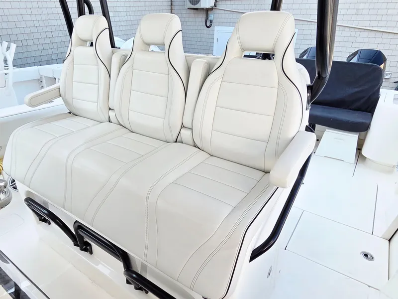Slide: The Image of 2023 SeaVee 37 Z boat with luxurious white leather seating. - 18