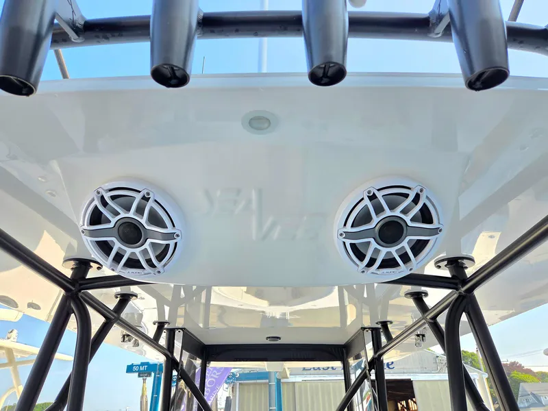 Slide: The Image of 2023 SeaVee 37 Z boat speakers and rod holders on the overhead console. - 20