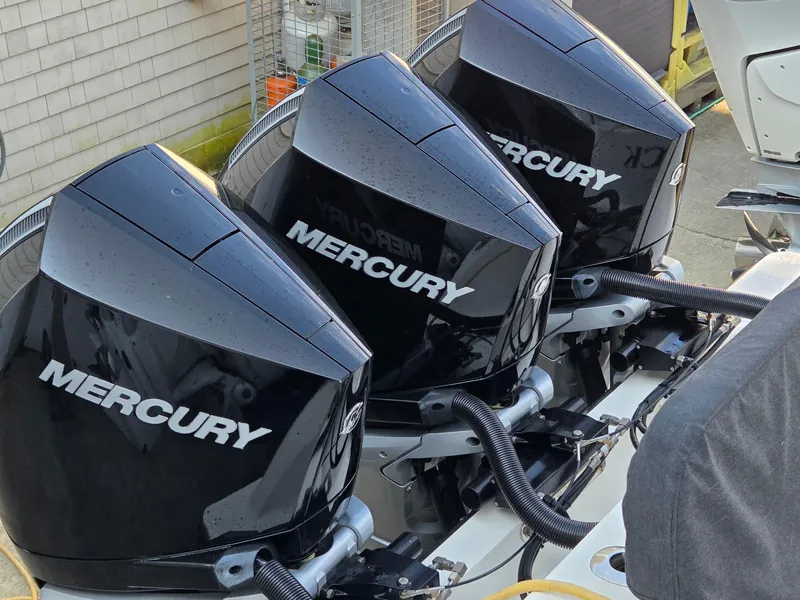 Slide: The Image of Triple Mercury outboard engines on a 2023 SeaVee 37 Z boat. - 26