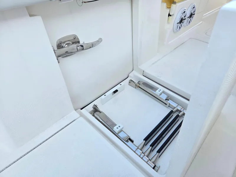 Slide: The Image of 2023 SeaVee 37 Z boat compartment with stainless steel hardware and speakers. - 28