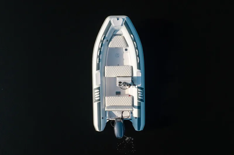 Slide: The Image of Overhead view of 2026 Novurania DL 400 boat on dark water. - 10