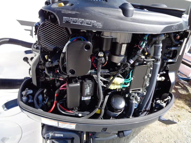 Slide: The Image of 2017 Robalo R260 Center Console boat engine, detailed view of internal components. - 17