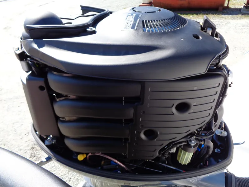 Slide: The Image of 2017 Robalo R260 Center Console engine, detailed view of the motor components. - 18