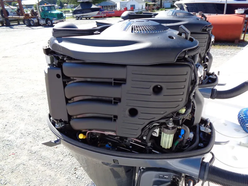 Slide: The Image of 2017 Robalo R260 Center Console boat engine, detailed view of outboard motor components. - 20