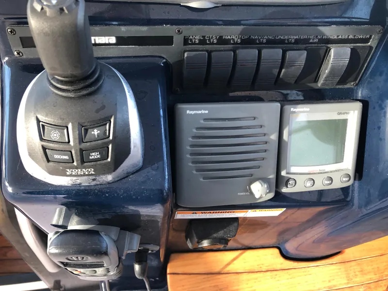 Slide: The Image of Control panel of a 2008 Tiara Yachts 3900 Sovran with navigation equipment. - 13