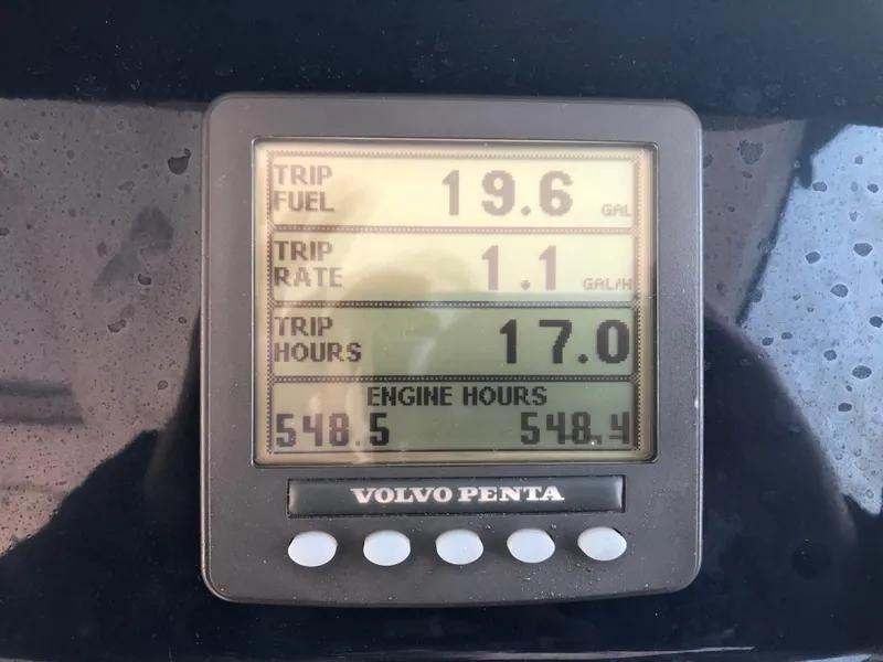 Slide: The Image of Volvo Penta display showing trip fuel, rate, hours, and engine hours on Tiara Yachts 3900 Sovran. - 15