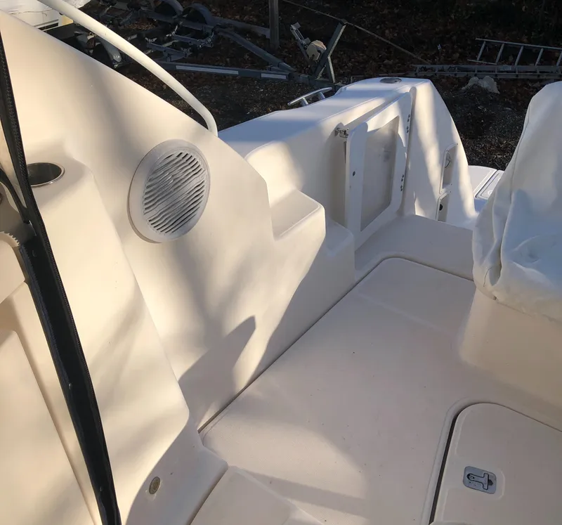 Slide: The Image of 2008 Tiara Yachts 3900 Sovran boat interior with speaker and seating area. - 24