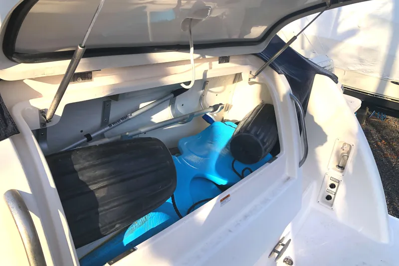 Slide: The Image of Storage compartment of 2008 Tiara Yachts 3900 Sovran with boating equipment. - 26
