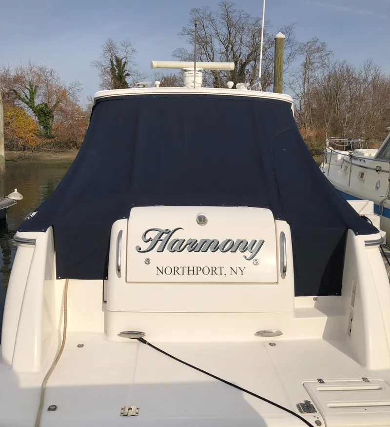 Slide: The Image of 2008 Tiara Yachts 3900 Sovran docked, named "Harmony," in Northport, NY. - 3