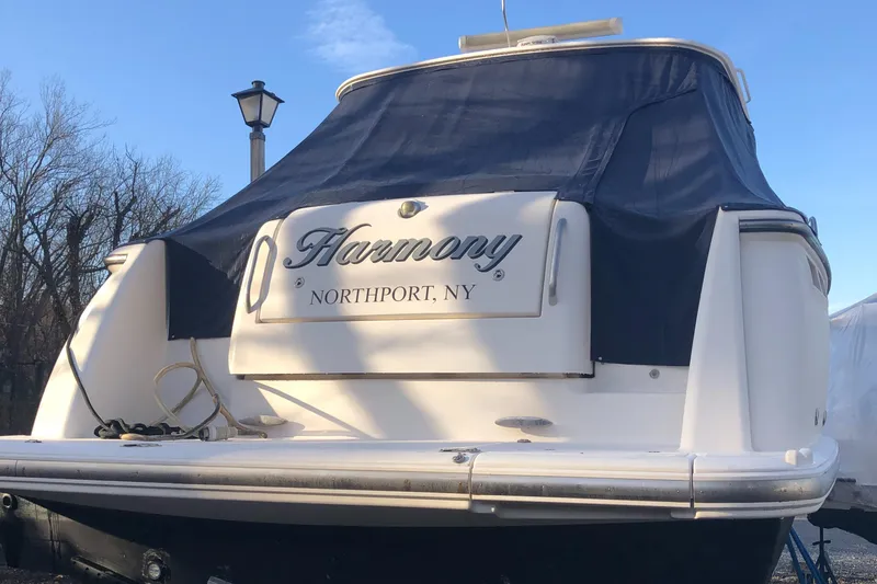 Slide: The Image of 2008 Tiara Yachts 3900 Sovran docked, rear view with cover, Northport, NY. - 4